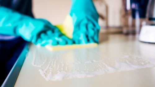 Cleaning staff maintaining washrooms and kitchen areas in a Kentishtown workplace