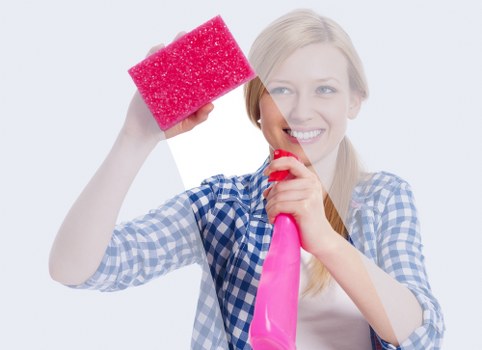 Local carpet cleaner treating stains on a staircase carpet in Kentishtown
